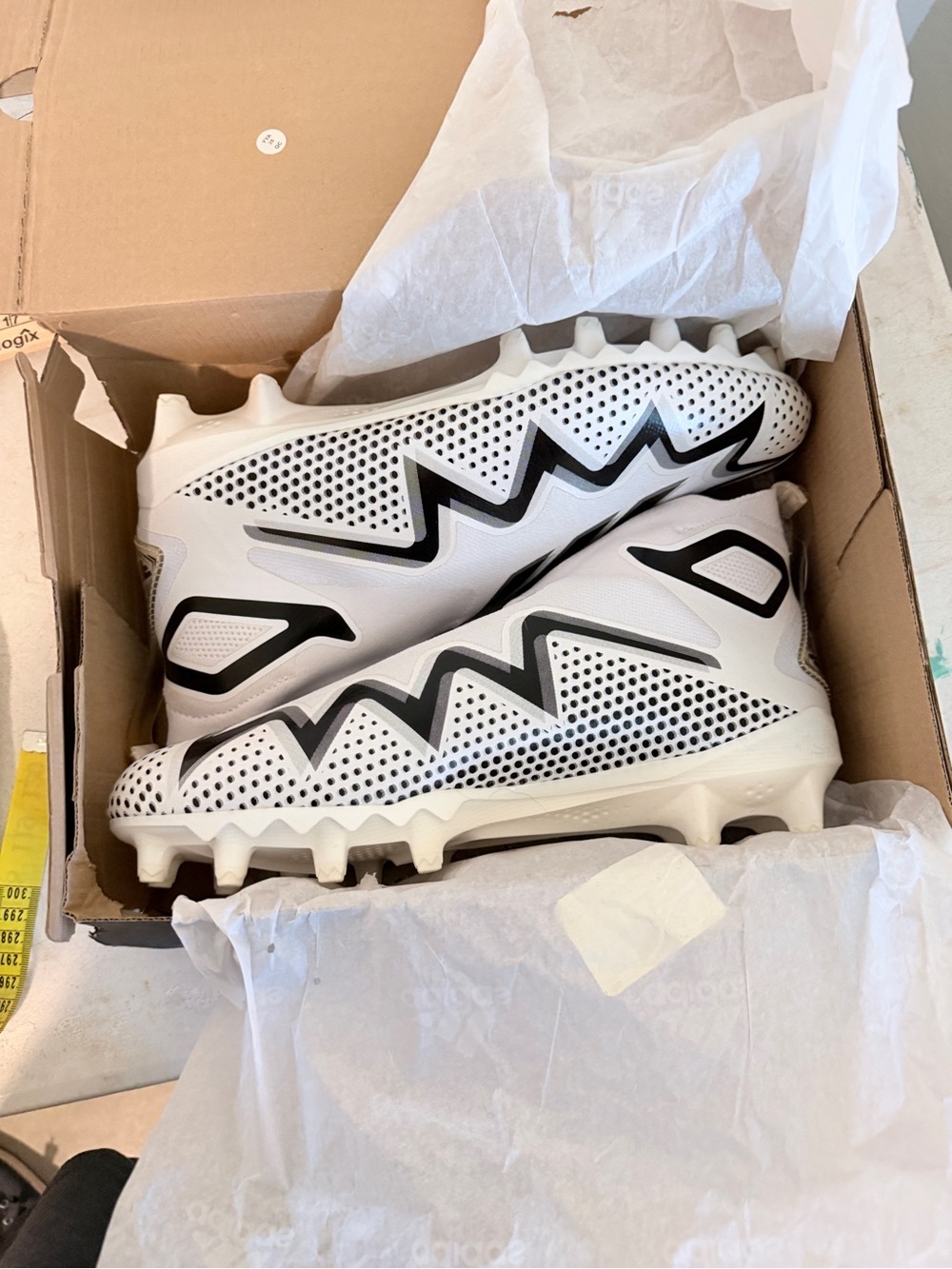 adidas White Soccer Cleats with Black Logo Accent